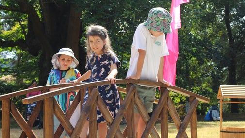 Children enjoying the Adventures in Blue summer trail at Petworth